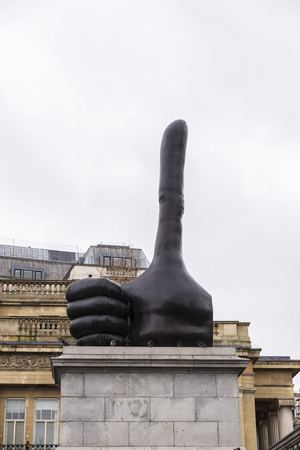 London, United Kingdom - January 1, 2017: Really Good Sculpture, work of David Shrigley with thumb up, in Trafalgar Square, London, England, United Kingdomのeditorial素材