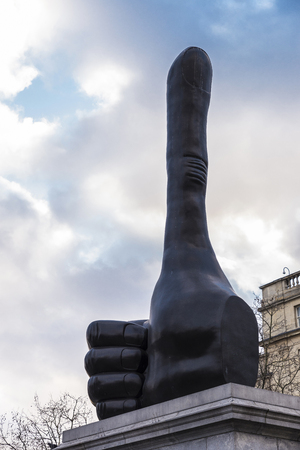London, United Kingdom - January 4, 2017: Really Good Sculpture, work of David Shrigley with thumb up, in Trafalgar Square, London, England, United Kingdomのeditorial素材
