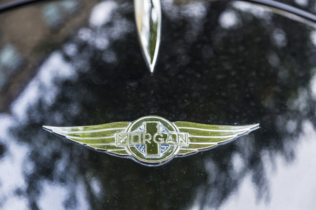 Amsterdam, Holland - September 8, 2018: Morgan car logo on a dark metallic car on a street in Amsterdam, Hollandのeditorial素材