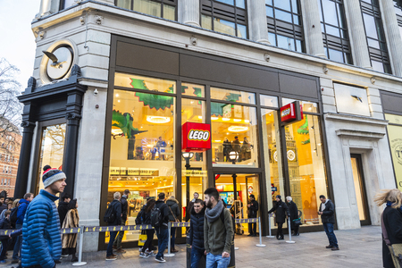 London, United Kingdom - January 1, 2018: Lego shop, known for the manufacture of Lego-brand toys, consisting mostly of interlocking plastic bricks, with people around in London, England, United Kingdomのeditorial素材