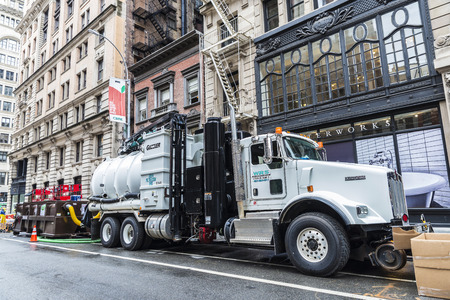 New York City, USA - July 25, 2018: Construction works on Fifth Avenue with heavy industrial truck in New York City, USAのeditorial素材