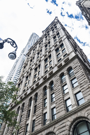 Facade of a modern and classic skyscrapers in Manhattan in New York City, USAの写真素材
