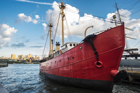 Red ship docked on a dock in Hudon River in Manhattan, New York City, USAの写真素材