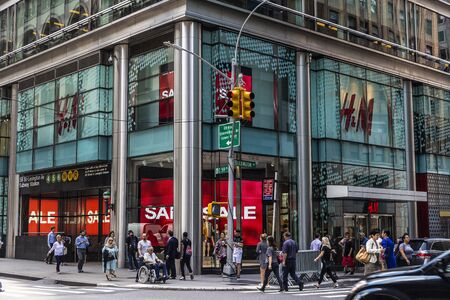 New York City, USA - July 31, 2018: H&M clothing store, in Fifth Avenue (5th Avenue) with people around in Manhattan in New York City, USAのeditorial素材