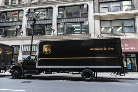 New York City, USA - July 31, 2018: UPS transportation company truck parked on a street of Manhattan with people around in New York City, USAのeditorial素材