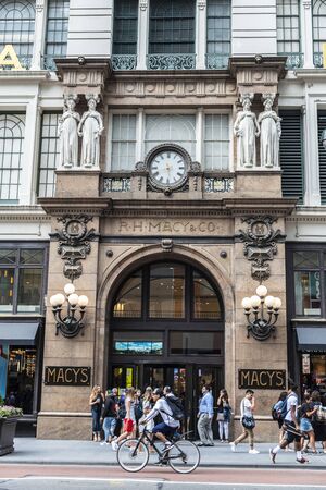 New York City, USA - July 31, 2018: Old classic facade of the Macys department store with people...