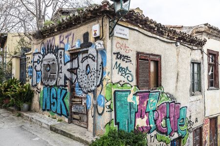 Athens, Greece - December 31, 2018: House with graffiti on a street of the Plaka neighborhood of Athens, Greeceのeditorial素材