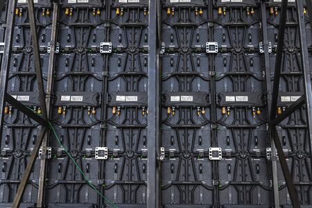 Athens, Greece - January 1, 2019: Rear view of a panel of connected speakers as background