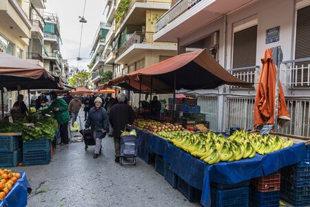 Athens, Greece - January 4, 2019: Farmer Market on a street with people choosing fruit and vegetables in Athens, Greeceのeditorial素材