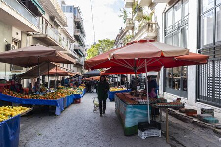 Athens, Greece - January 4, 2019: Farmer Market on a street with people choosing fruit and vegetables in Athens, Greeceのeditorial素材