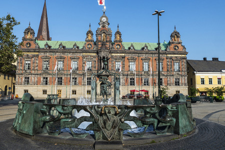 Fountain and the old classic Malmo City Hall in Stortorget, a large plaza in the center of Malmo in Swedenのeditorial素材