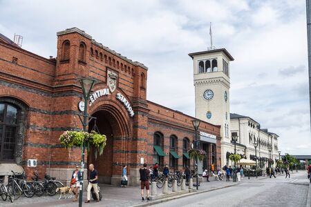 Malmo, Sweden - August 30, 2019: Facade of the Central Station of Malmo with people around in Swedenのeditorial素材