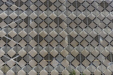 Facade of a skyscraper with square shaped as abstract background in Malmo, Swedenのeditorial素材