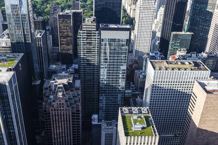 Elevated view of the skyline of modern skyscrapers of Manhattan from Top of the Rock in New York City, USAの写真素材