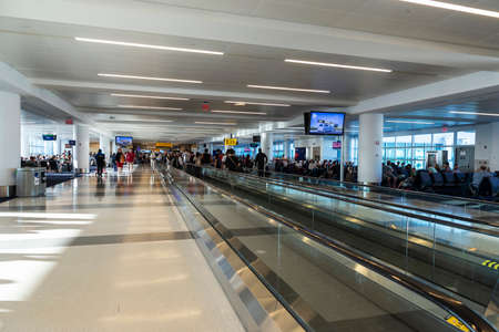 New York City, USA - August 4, 2018: Interior of John F. Kennedy International Airport (JFK Airport, JFK or Kennedy) with people walking in Queens, New York City, USAのeditorial素材