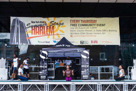 New York City, USA - August 4, 2018: People in gymnastics and relaxation classes in the Summer Stage in the Adam Clayton Powell Jr. State Office Building, Harlem, Manhattan, New York City, USA