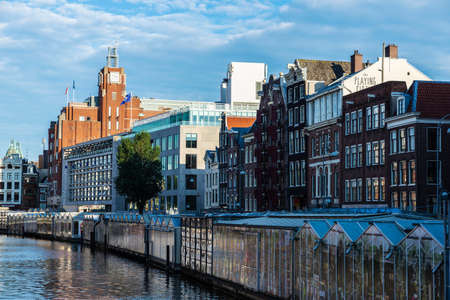 Amsterdam, Netherlands - September 9, 2018: Singelgracht canal with leaning houses and NH hotel in the old town of Amsterdam, Netherlandsのeditorial素材