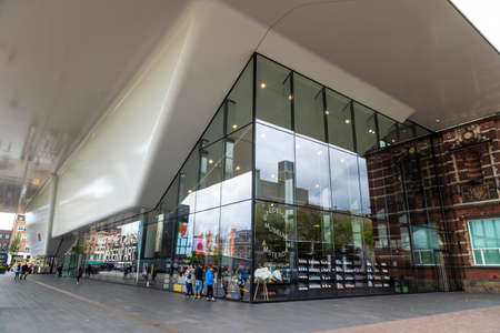 Amsterdam, Netherlands - September 9, 2018: Facade of the Van Gogh Museum with people around in the...