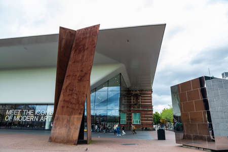 Amsterdam, Netherlands - September 9, 2018: Facade of the Van Gogh Museum with people around in the Museumplein (Museum Square) in Amsterdam, Netherlandsのeditorial素材