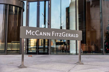 Dublin, Ireland - January 1, 2020: Sign of the McCann FitzGerald Solicitors Headquarters, Irish law firm, in Dublin, Irelandのeditorial素材