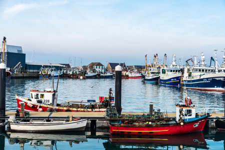 Howth, Ireland - January 1, 2020: Fishing ships in the small trading port of Howth, fishing village near Dublin, Irelandのeditorial素材