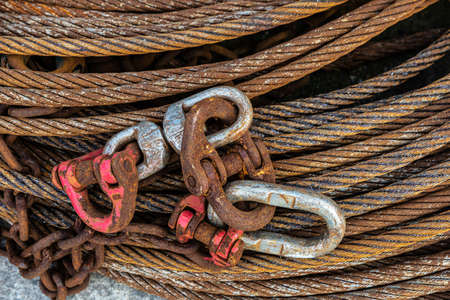 Heap of old rusty metal chains and cable used for fishing as background in the port of Howth, Irelandの写真素材