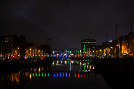 Dublin, Ireland - December 30, 2019: Dublin view at night with decoration and Christmas lights from the River Liffey, Irelandのeditorial素材