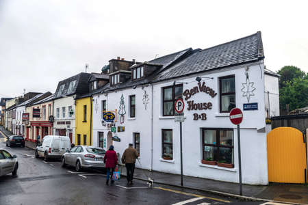 Clifden, Ireland - January 4, 2020: Shopping street with restaurants, irish pubs, shops and people around in the town of Clifden, in the region of Connemara, Irelandのeditorial素材