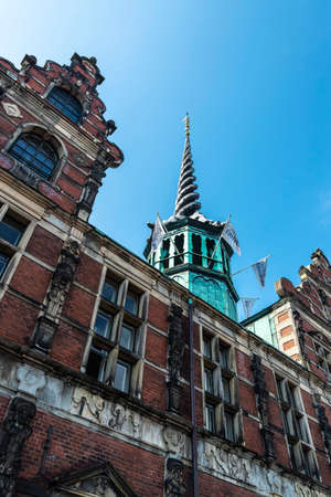 Copenhagen, Denmark - August 27, 2019: Facade of the BÃ¸rsen or BÃ¸rsbygningen, The Stock Exchange building, with its spiral tower in Copenhagen, Denmarkのeditorial素材