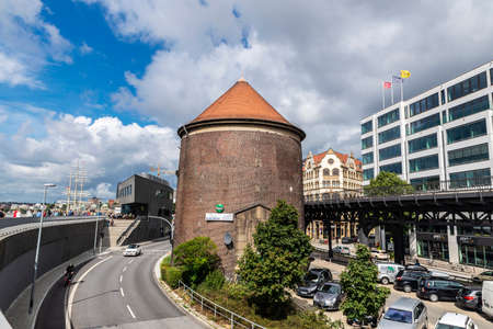 Hamburg, Germany - August 16, 2019: Road with traffic and Galego restaurant in the promenade of St....