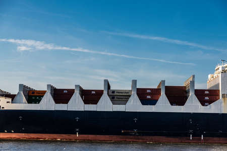 Hamburg, Germany - August 22, 2019: Container cargo ship of the company ACL sailing on the Elbe river in the port of Hamburg, Germanyのeditorial素材