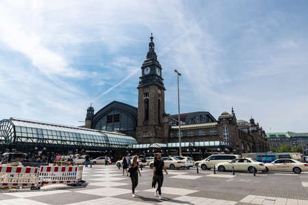 Hamburg, Germany - August 23, 2019: Facade of the Hamburg Hauptbahnhof, central railway station, with taxis and people around in Hamburg, Germanyのeditorial素材