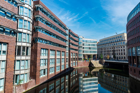 Hamburg, Germany - August 23, 2019: Modern buildings next to a canal in the neighborhood of Neustadt, in the center of Hamburg, Germanyのeditorial素材