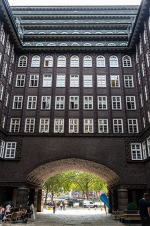 Hamburg, Germany - August 23, 2019: Courtyard of the Chilehaus (Chile House), an old office building with people around in Hamburg, Germanyのeditorial素材