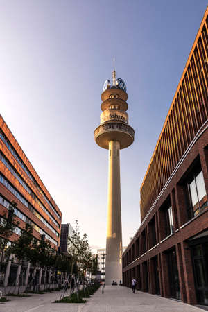 Hanover, Germany - August 19, 2019: View of the VW-Tower, radio telecommunications tower with people around in Hanover, Germanyのeditorial素材