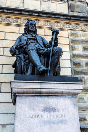 Statue of Ludvig Holberg on the Royal Danish Theater in Kongens Nytorv, Copenhagen, Denmarkのeditorial素材