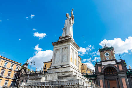 Monument of Dante Alighieri and the facade of the Convitto Nazionale Vittorio Emanuele II in the Piazza Dante in Naples, Italyのeditorial素材