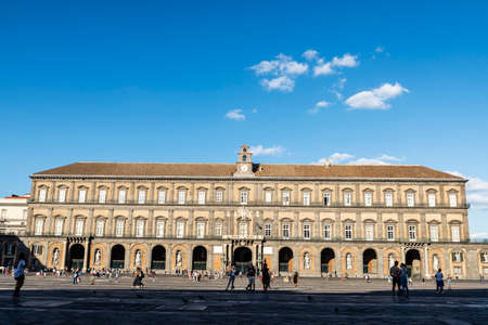 Naples, Italy - September 9, 2019: Facade of the Royal Palace of Naples (Palazzo Reale di Napoli) in Piazza del Plebiscito with people around, Italyのeditorial素材