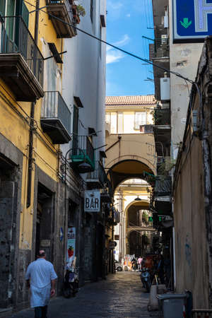 Naples, Italy - September 10, 2019: Narrow street with people around in the old town of Naples, Italyのeditorial素材