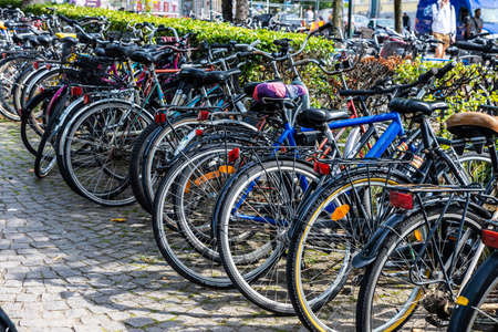 Lund, Sweden - August 30, 2019: Large bicycle parking station full of bicycles parked on a row in Lund, Scania, Swedenのeditorial素材
