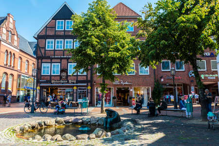 Hansestadt Stade, Germany - August 22, 2019: Shopping street with shops and people around in Hansestadt Stade, Lower Saxony, Germanyのeditorial素材