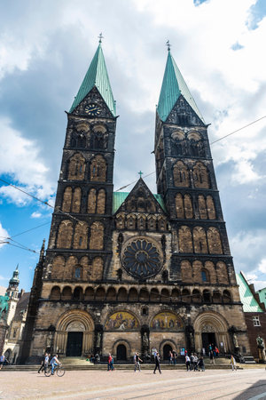 Bremen, Germany - August 19, 2019: Facade of the Bremen Cathedral with people around in the center of Bremen, Germanyのeditorial素材