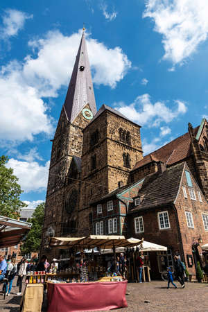 Bremen, Germany - August 19, 2019: Bremer Marktplatz (Bremen Market Square) and the Church of Our Lady (Kirche Unser Lieben Frauen) with people around in Bremen, Germanyのeditorial素材