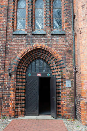 Door of the St. Michaelis or Michel Church in the old town of Lunenburg, Lower Saxony, Germanyの写真素材