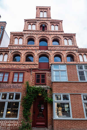 Lunenburg, Germany - August 17, 2019: Facade of the typical crow-stepped gabled town house in Lunenburg, Germanyのeditorial素材