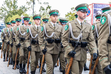 Warsaw, Poland - September 1, 2018: Military parade of soldiers in Krakowskie Przedmiescie in the old town of Warsaw, Polandのeditorial素材