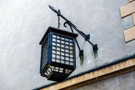 Medieval style wrought iron lantern in the old town of Warsaw, Polandの写真素材