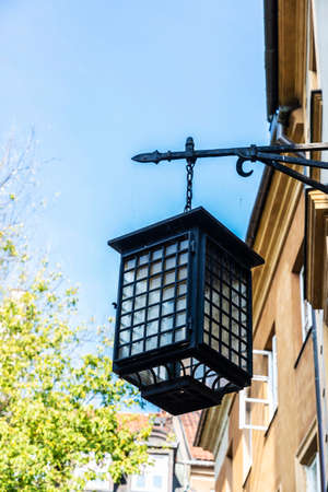 Medieval style wrought iron lantern in the old town of Warsaw, Polandの写真素材
