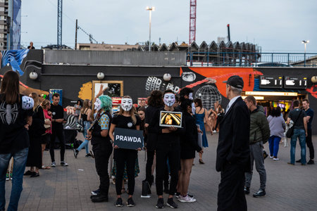 Warsaw, Poland - September 2, 2018: Individuals appearing in public as Anonymous, wearing Guy Fawkes masks reporting animal abuse in Warsaw, Polandのeditorial素材