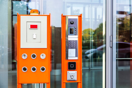 Access control system with video intercom, emergency or alarm siren and security camera at the...